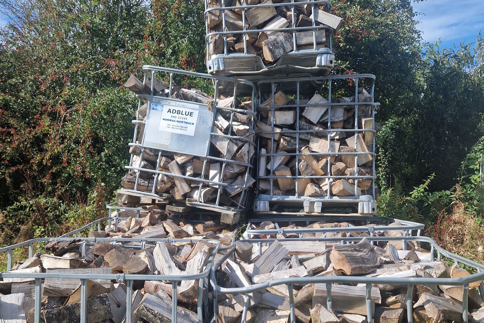 Seasoned hardwood stacked in bulk bags
