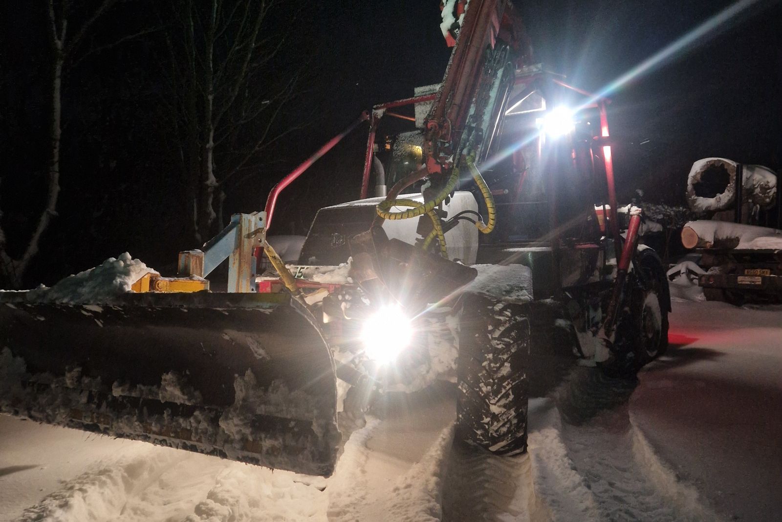 Night ploughing on a private access road